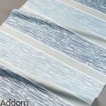 Materiał w wąskie i szerokie pasy