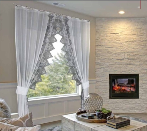 firany upinane na boki z popielatymi wzorami.jpeg